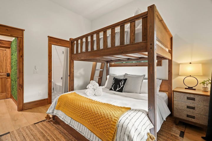 This is second bedroom in the basement. This one has an attached bathroom and a queen-over-king bunk.