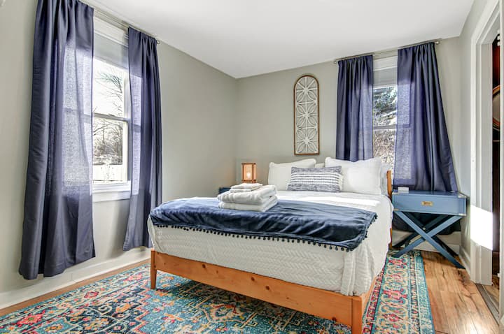 1st floor bedroom contains a luxury queen-sized bed, room darkening blinds, closet and dresser.