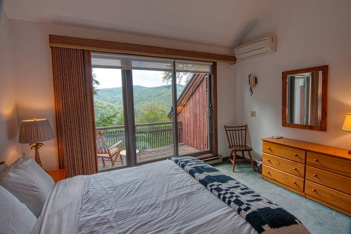Queen bedroom located upstairs with private balcony