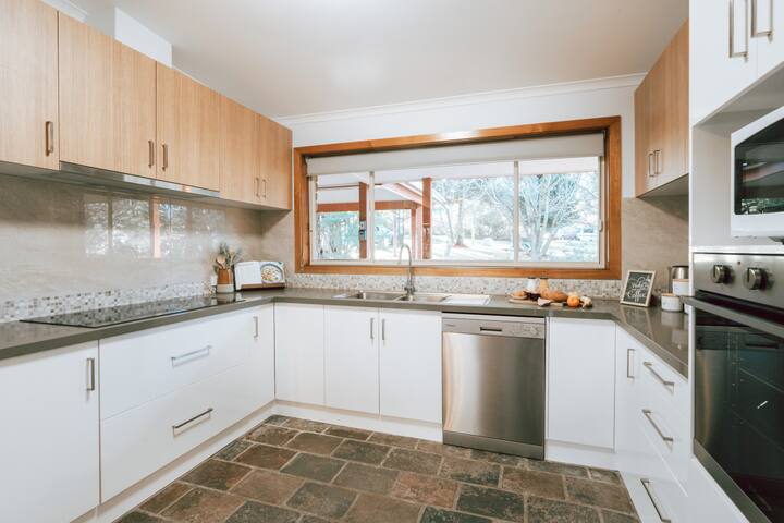 4 bed home nestled amongst nature + fire place gallery image 4