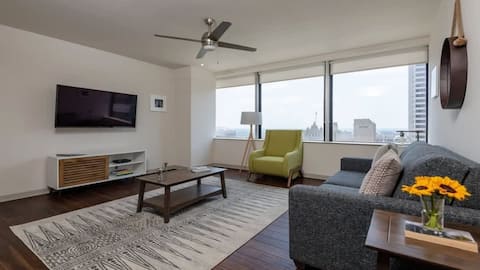 Top performing Airbnb: TWO Comfort CozySuites at LTV 4BR with Pool, Gym in City Center District