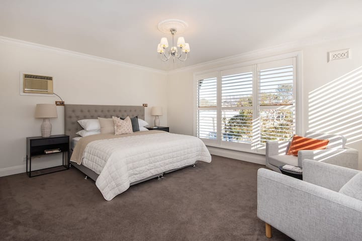 Bedroom  five, upstairs master bedroom with bay views and luxurious ensuite 