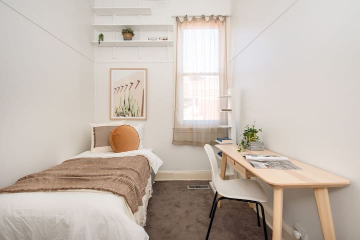 Bedroom three with single bed and desk 