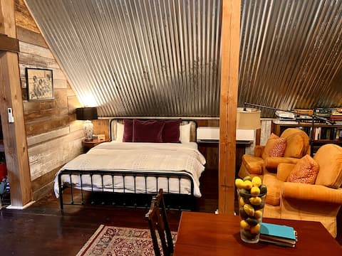 Top performing Airbnb: Mini-cow farm; Historic Barn-loft king bed in Southwest Arkansas Rural