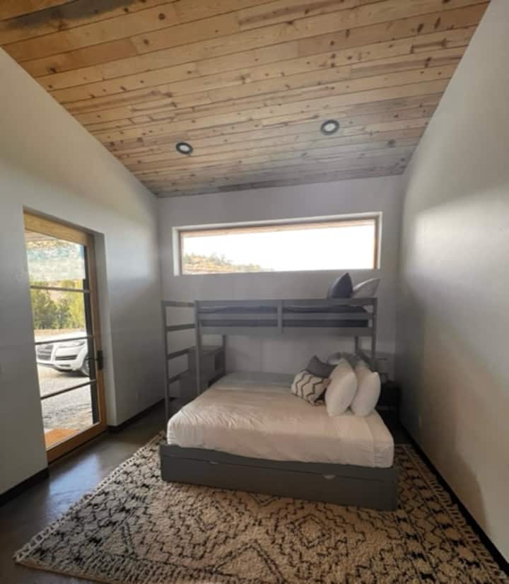 2nd bedroom with a twin on top, a king below and a twin pull out