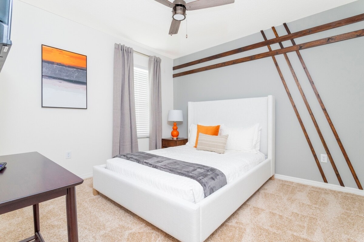 Another of our rooms adorned with delightful decor and an queen size bed for every family member comfort! —a magical space designed to turn vacation time into an enchanting experience for your loved ones. 