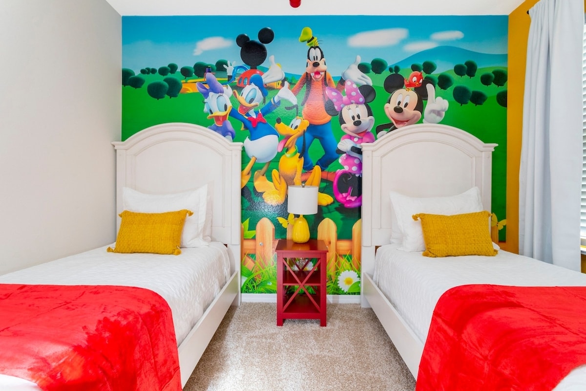Welcome to the kids' room adorned with delightful Mickey Mouse decor and two individual bed for every kids comfort! —a magical space designed to turn vacation time into an enchanting experience for your little ones. 