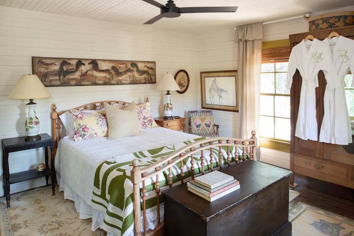 A cozy, eclectic queen bedroom