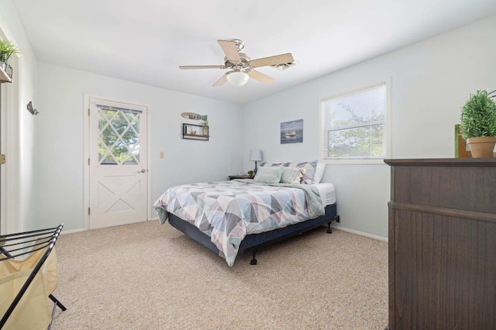A cozy and charming upstairs bedroom, perfect for a restful night’s sleep away from the bustle of the main level.