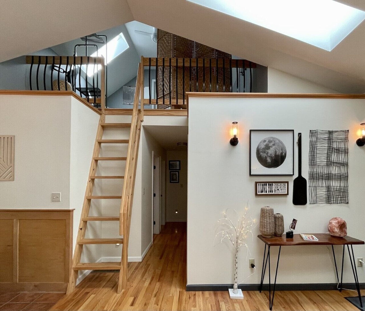 Wooden ladder to loft. This is considered a bonus room. 