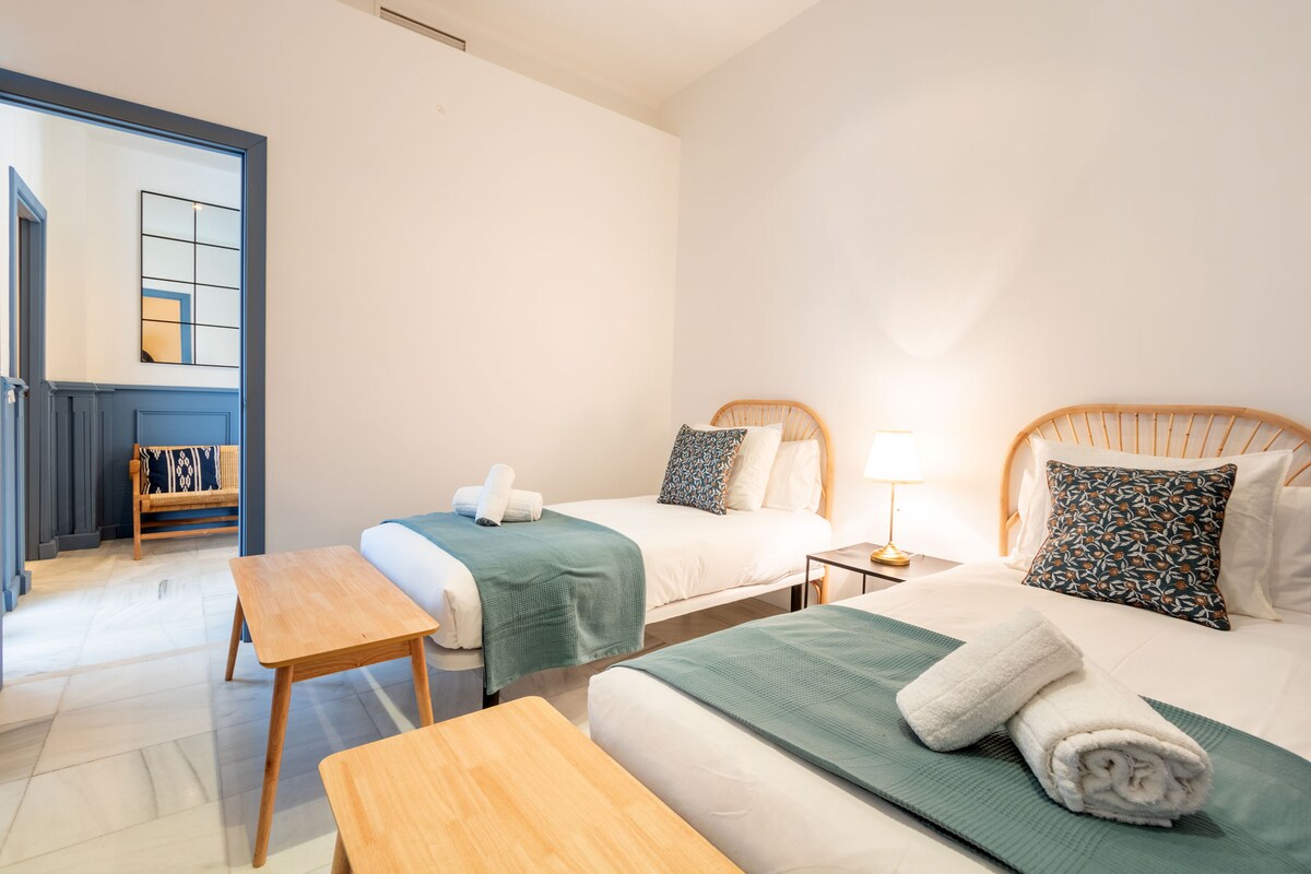 ห้องนอนพร้อมเตียงเดี่ยวสองเตียง