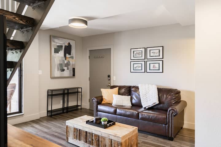 A second living area adds extra room to spread out, with a queen sleeper sofa providing flexible sleeping space for additional guests.