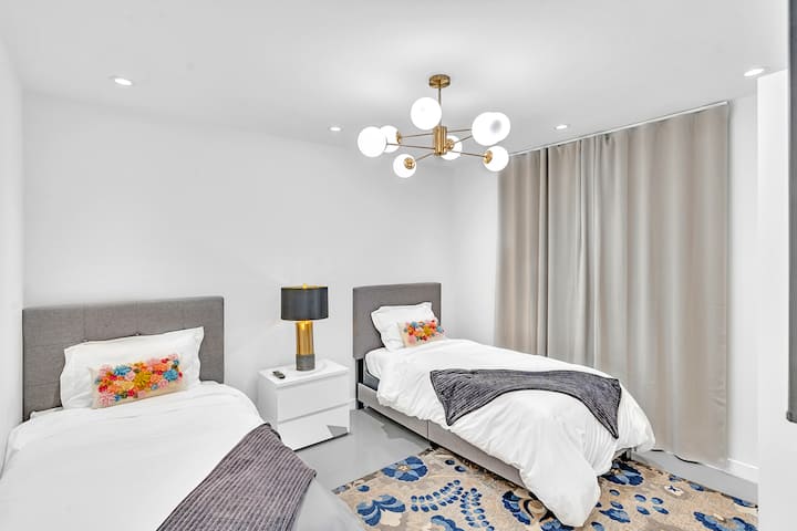 Relaxing bedroom with oceanfront balcony for a peaceful retreat.