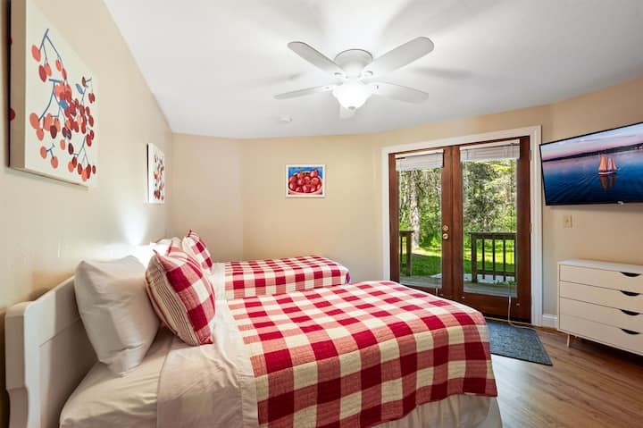 Dream away in our serene and beautifully appointed bedroom on the lower floor with two twin beds.