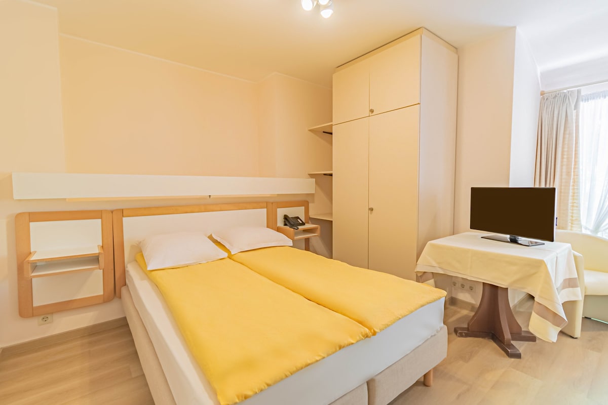 Ambienti i dhomës së gjumit