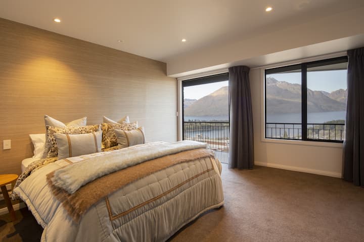 Guest bedroom with lake views