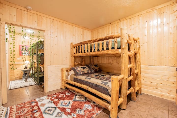 The second basement bunk room features a mortise & tenon full-twin bunk.