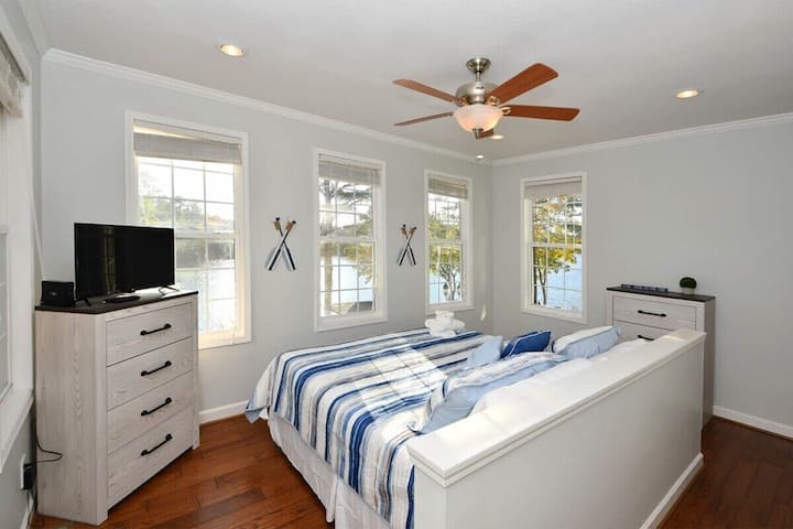 Master bedroom that boasts a King Bed