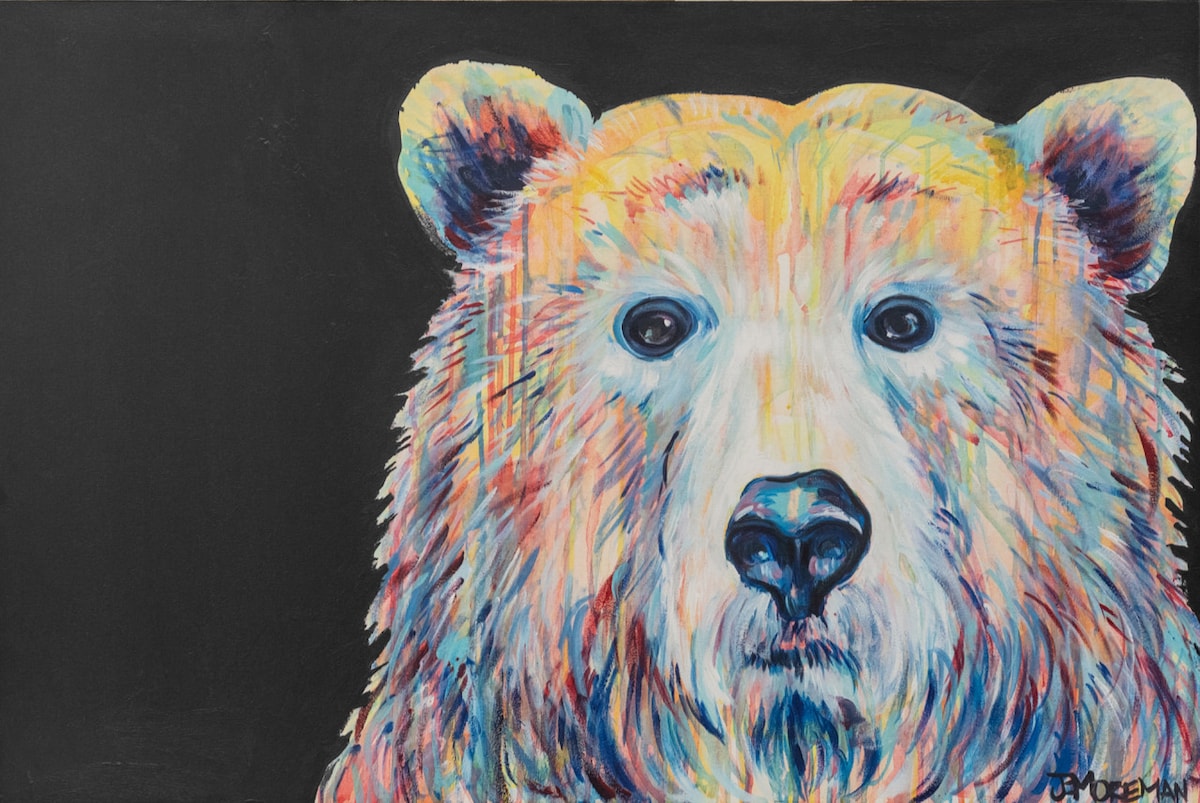 A vibrant and colorful painting of a bear's face is displayed against a contrasting dark background. The bear's expressive eyes and fur are rendered in bold brushstrokes, showcasing a spectrum of colors and capturing a sense of warmth and presence.