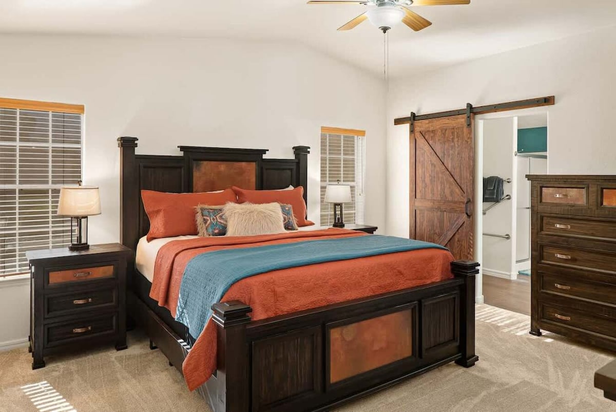 King suite bedroom with private master bathroom.