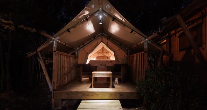 View inside the small guest tent. It also has its own uncovered platform with seating.