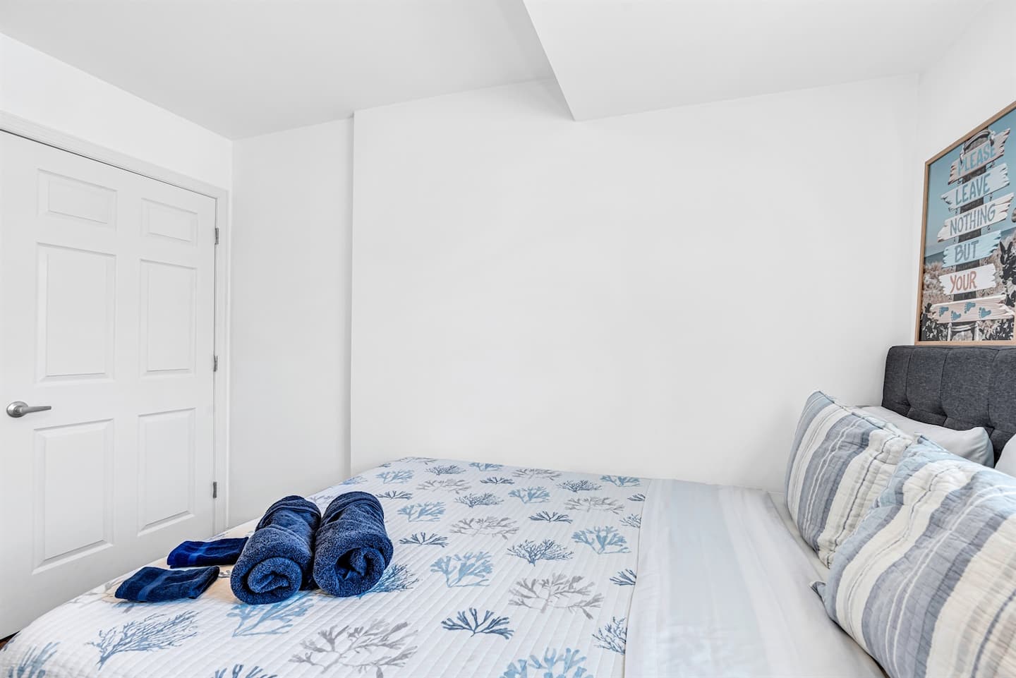 Notice the folded towels staged on the bed for your arrival. Small detail, but it's the signal the host actually cares about the turnover.