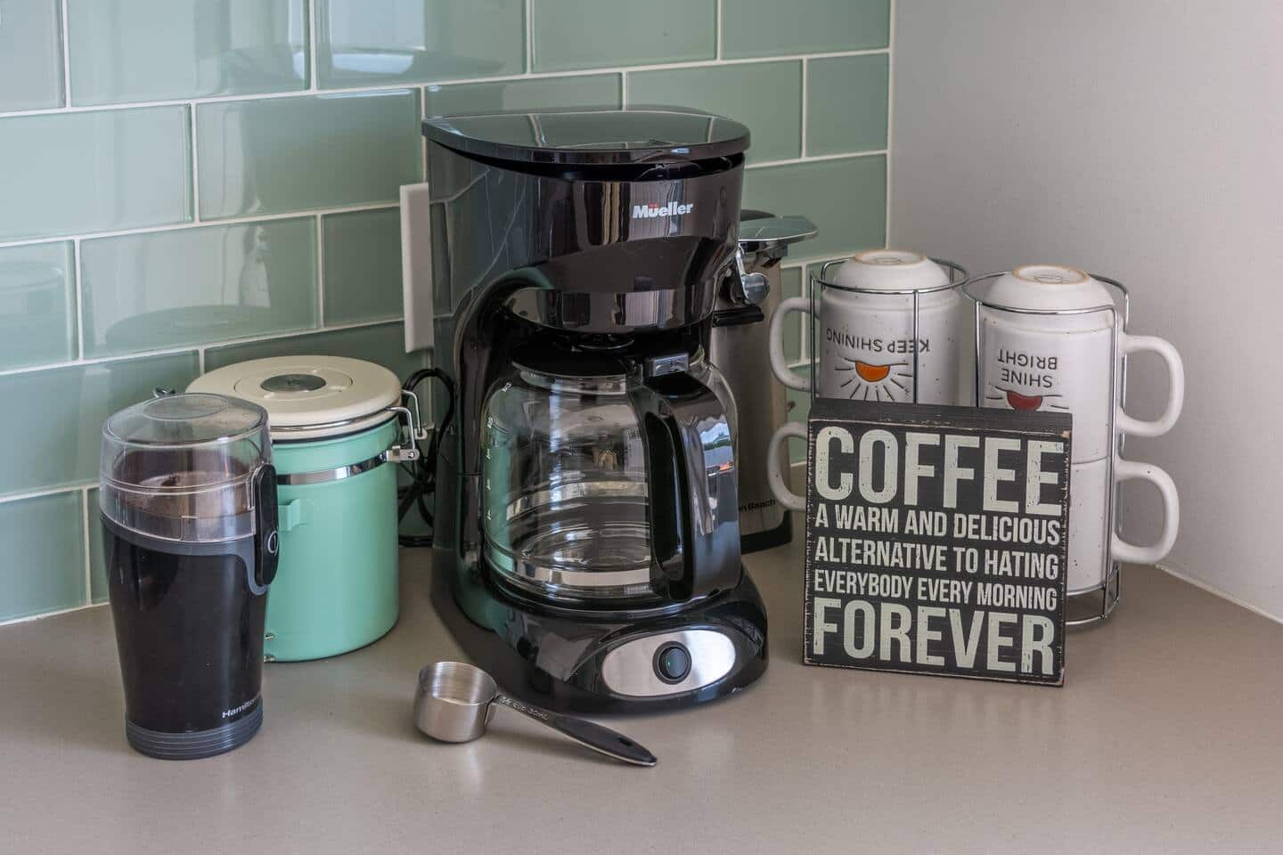 Yours is the first cup before anyone else is up. The COFFEE FOREVER station is loaded, grinder ready, beach within walking distance from here.