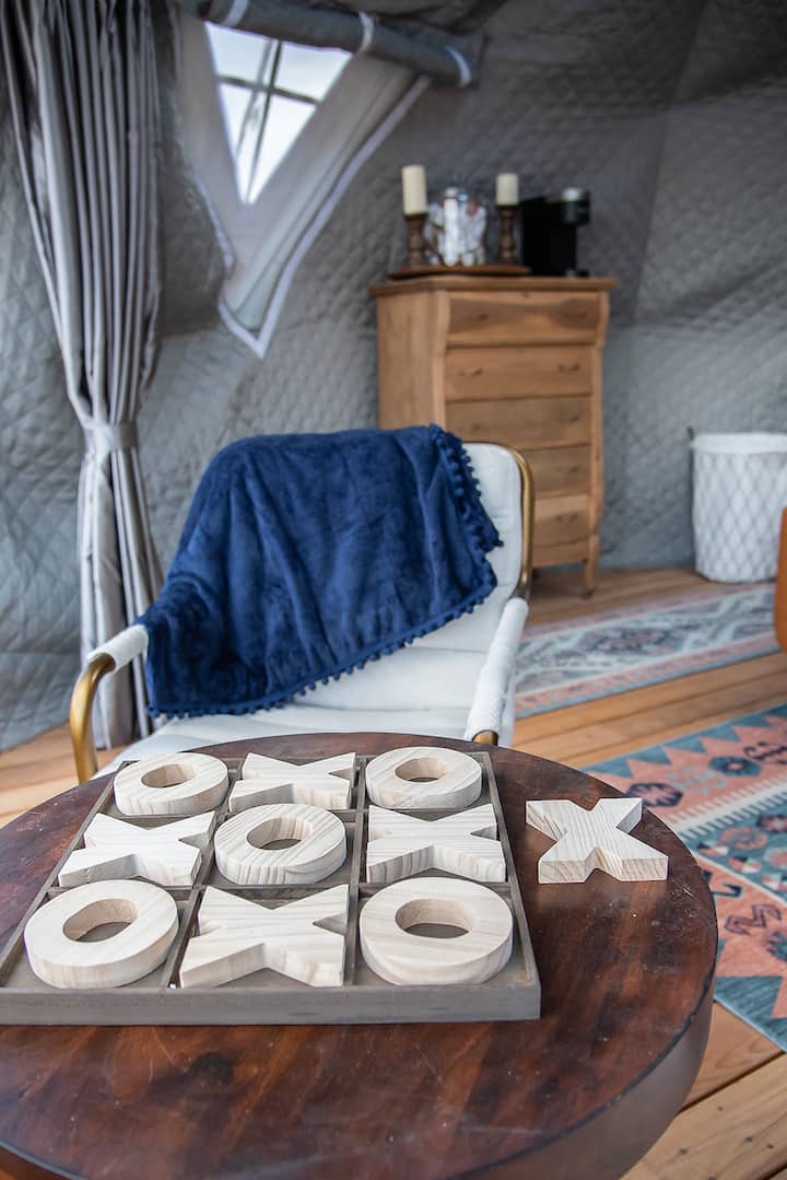 Accent chairs, games and Dresser. Glamping Near Zion National Park and Kolob Canyon and Kanarra fall