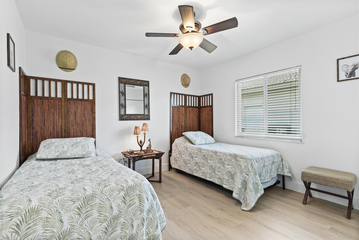 Let the Kids Roar into Dreamland in the 3rd Bedroom, Featuring Separate Single Beds and Enchanting Safari Decor.