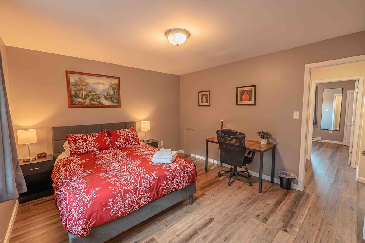 A perfect blend of natural light and cozy decor creates a welcoming bedroom retreat.