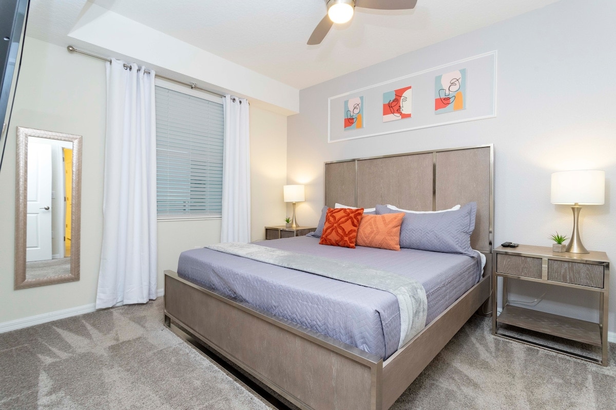 Master bedroom with a king size bed