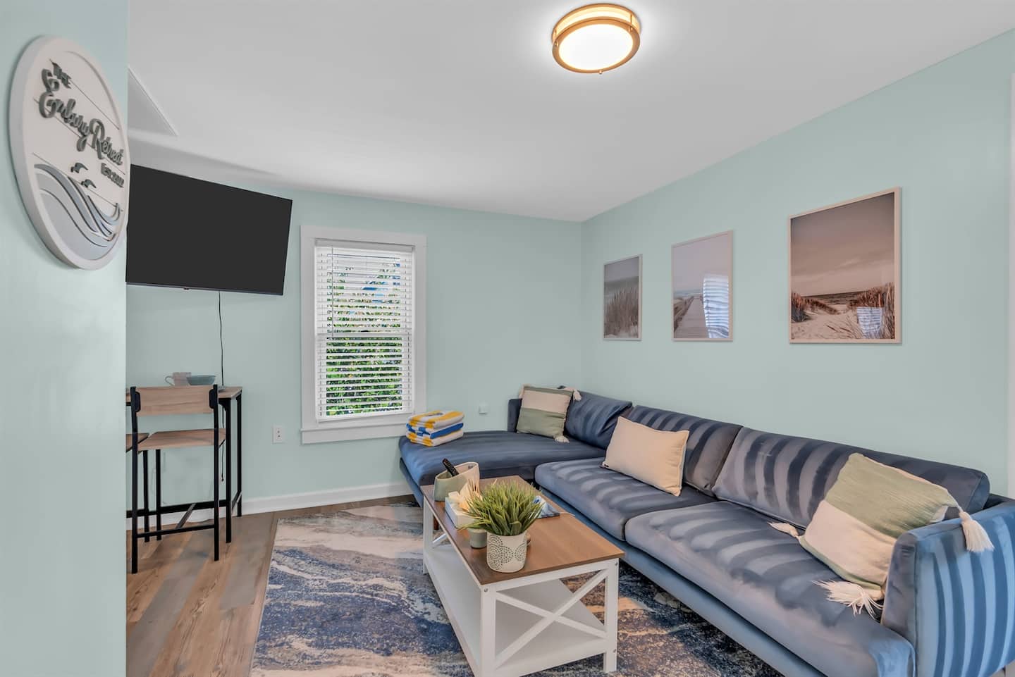 Our bright, modern beach retreat blends comfort and style. Unwind on the plush sofa, enjoy smart TV, or plan your Jersey Shore adventures. Your cozy Ocean Grove escape awaits!