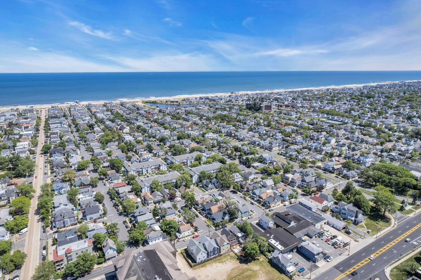 Aerial view over the Ocean Grove rooftops toward the Atlantic