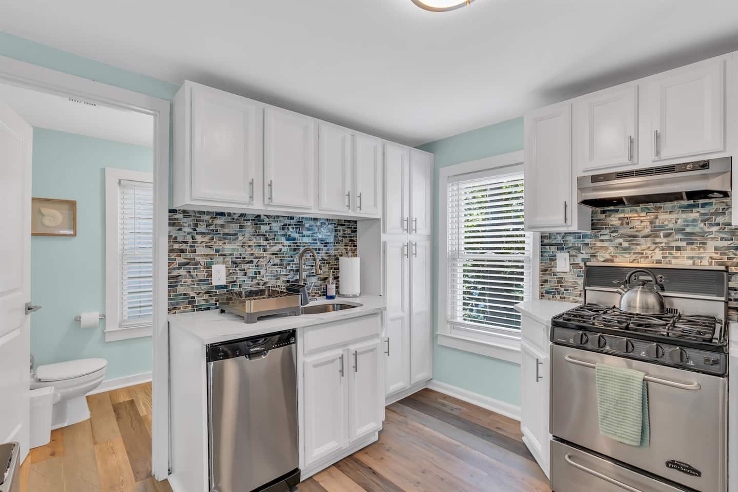 Updated kitchen with the essentials such as dish soaps, paper towels, trash bags and sponges to make arrival stress free.