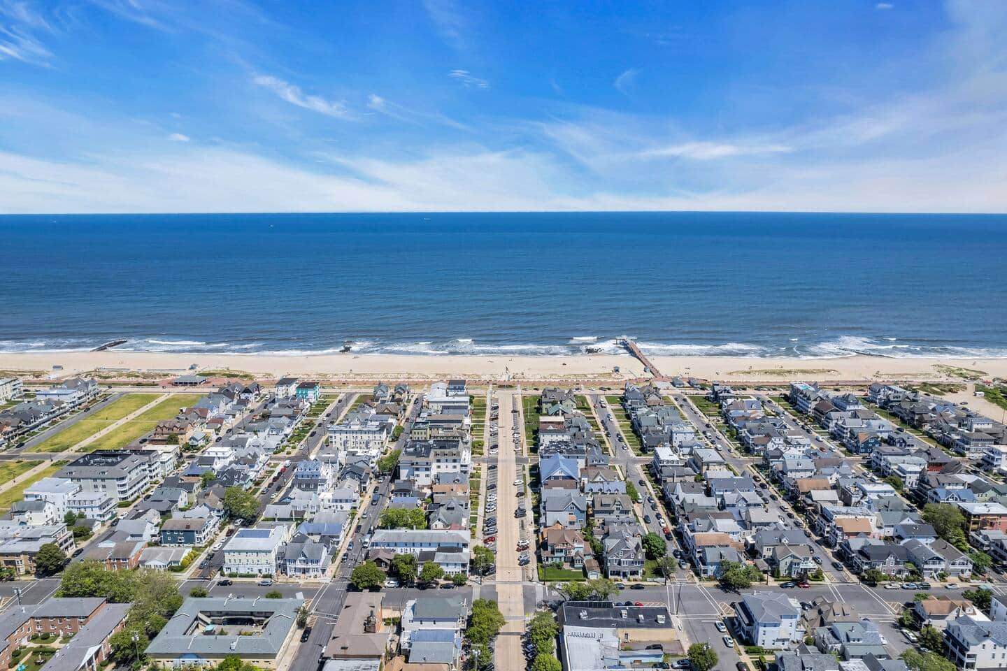 Aerial view straight out over the dunes and the Atlantic horizon