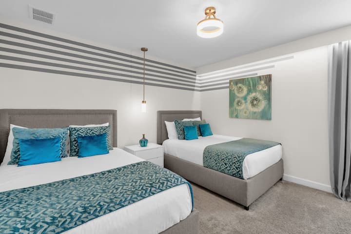 Moderna spavaća soba s 2 bračna kreveta