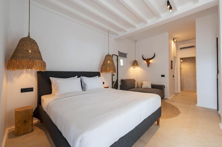 
"Experience unparalleled luxury in our Mykonos villa, boasting exquisite bedrooms with ensuite bathrooms. Relaxation awaits, creating unforgettable moments in ultimate comfort."