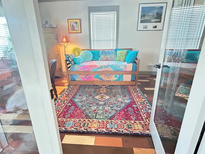Feel comfortable and invited in this new slide out trundle bed. This also serves as a day room for comfortable seating, plus two antique desks for remote work so you can work uninterrupted with high speed Wi-Fi