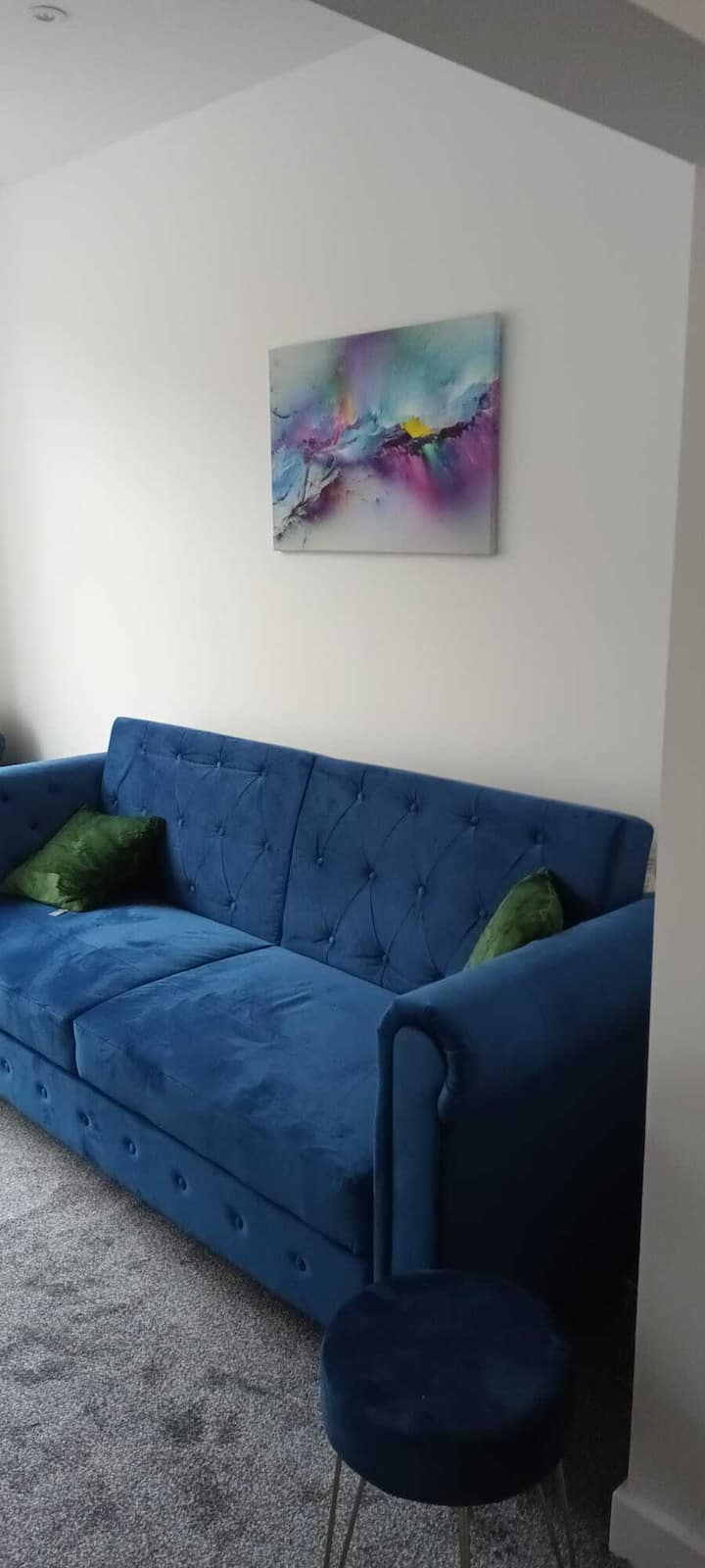 Sebule yenye kitanda cha sofa mbili