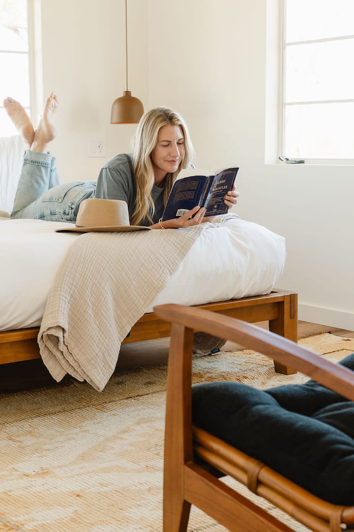 Our Juniper Bedroom is perfect for enjoying a book in the morning sun