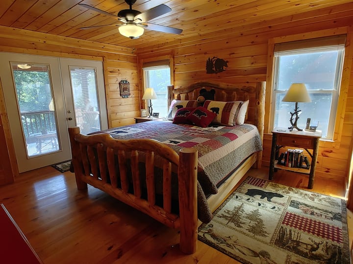 Main level master bedroom with king bed and easy access to living areas