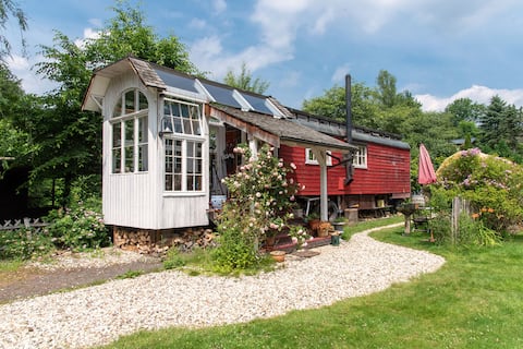 Circus wagon by the river
