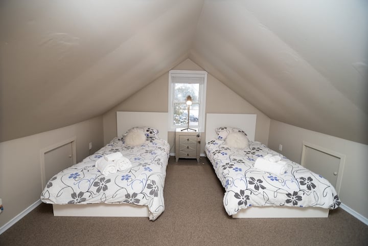 2 Single Beds in the upstairs/loft room of the home.
