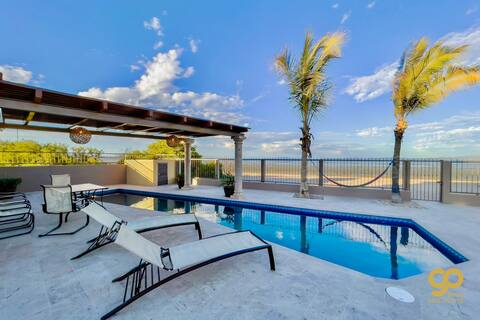 Beachfront Paradise: Pool, BBQ, & Bay Views