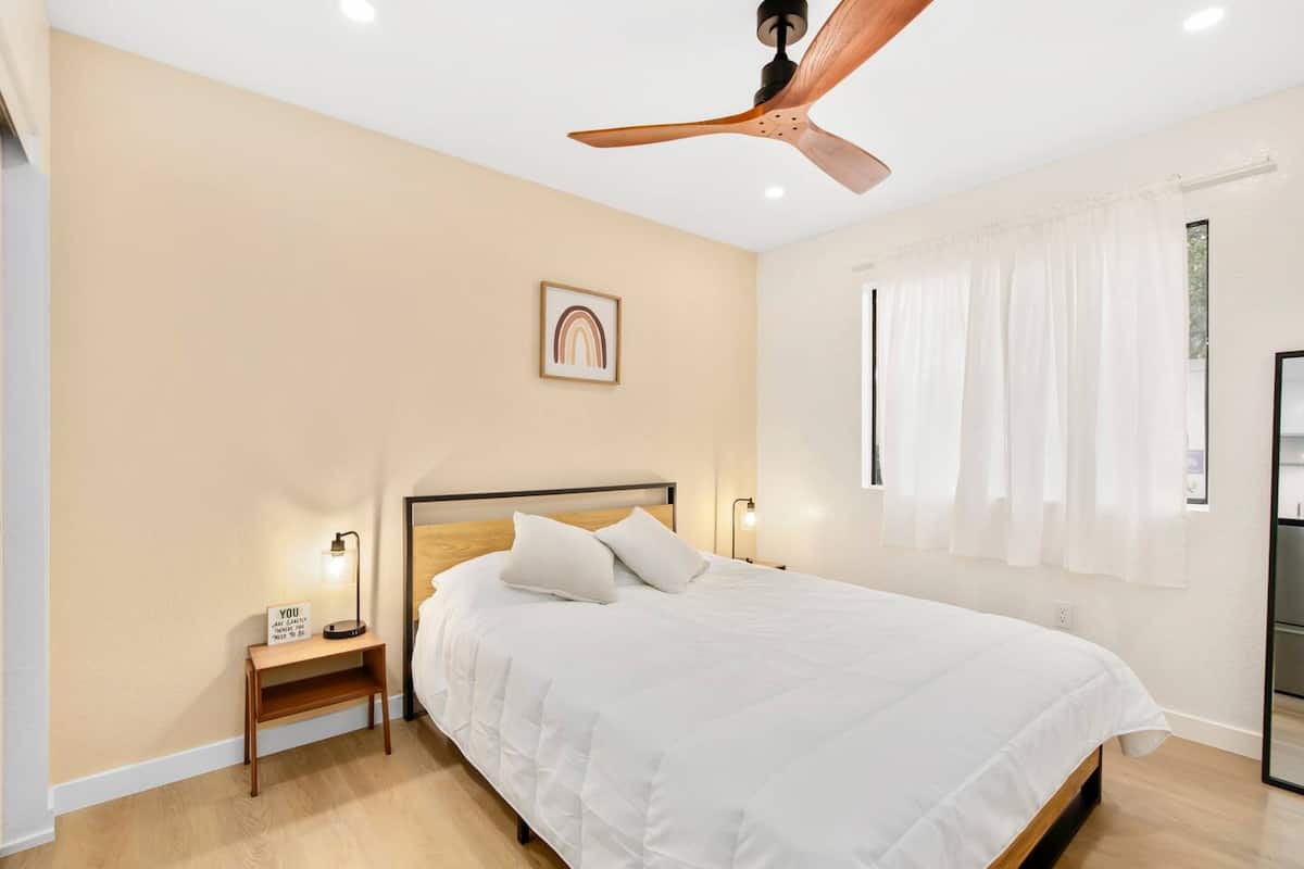 Modern queen bedroom suite with elegant décor in El Cajon vacation rental