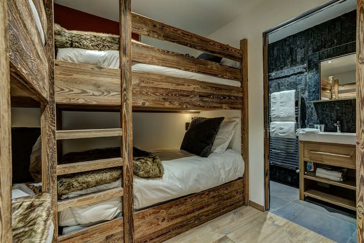 Bedroom 5, two sets of bunk beds, with ensuite shower room with WC