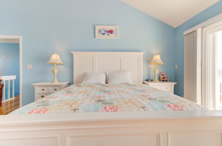 Главна спална соба за трчање со делфини