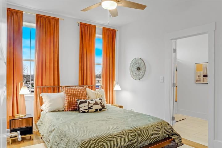 Upstairs bedroom with a queen bed