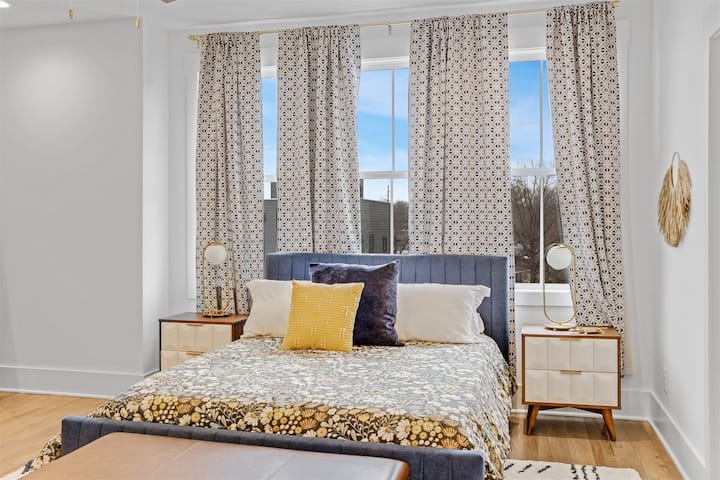 Upstairs bedroom with a queen bed