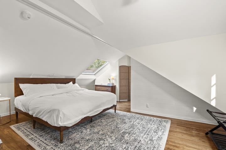 King bed in the upstairs space